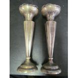 A pair of silver spill vases