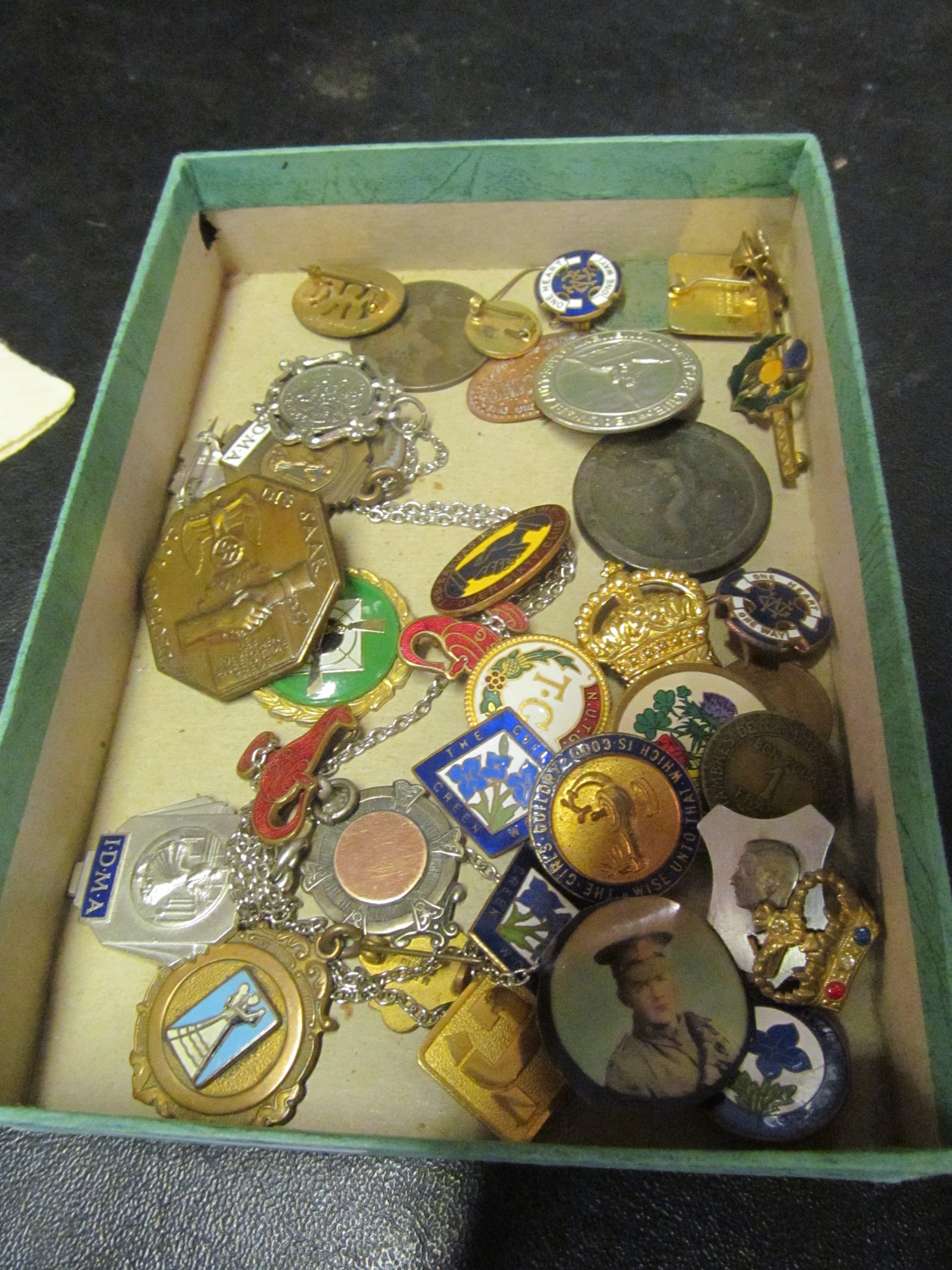 Various badges and coins