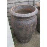 A large ali baba style garden urn