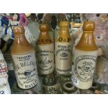 Four small advertising stoneware bottles, Belfast/Londonderry