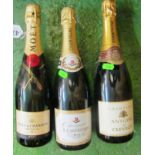 A bottle Moet & Chandon, A Carpentier Champagne and Antone de Clevecy
