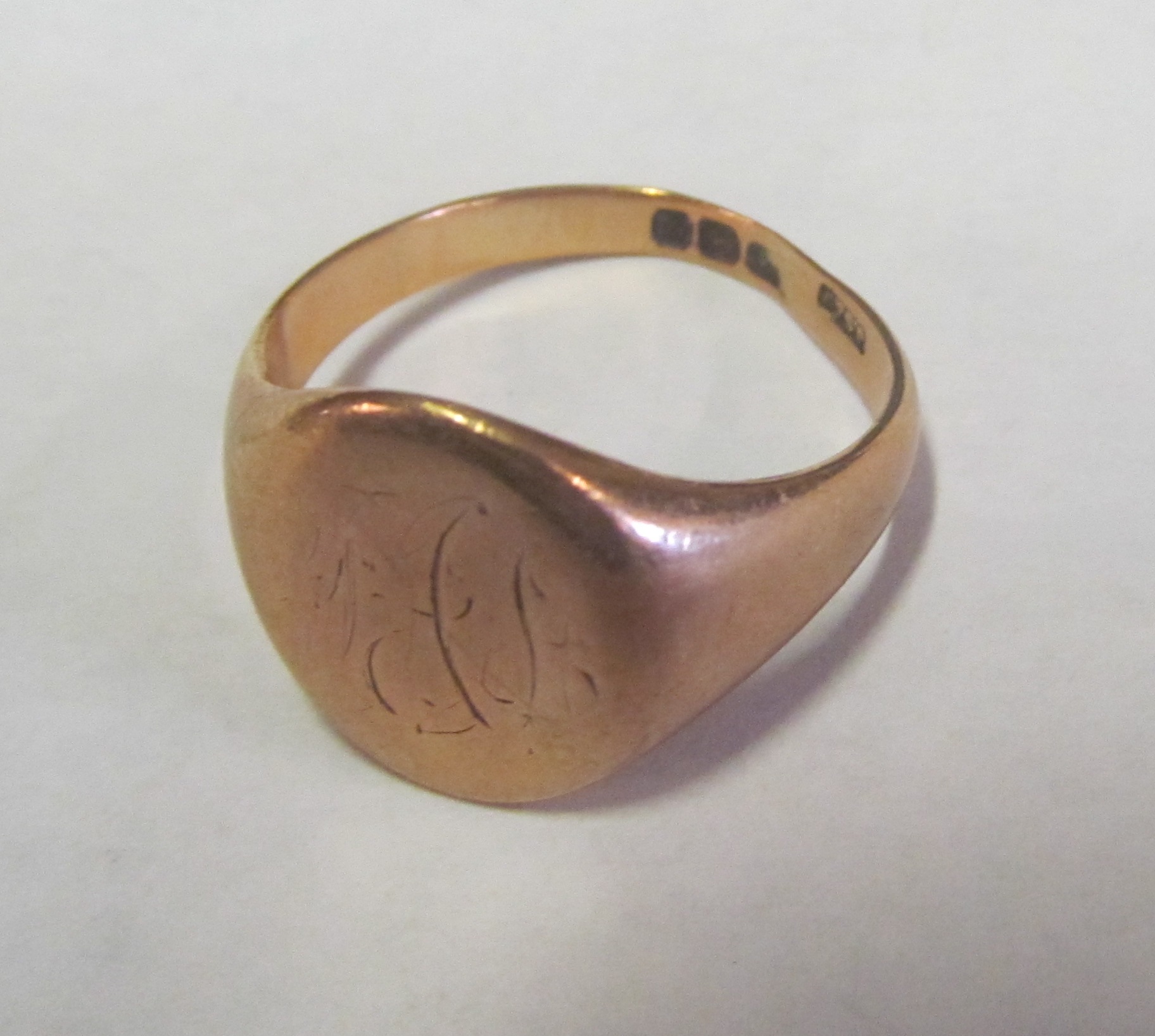 A gold signet ring