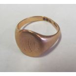 A gold signet ring