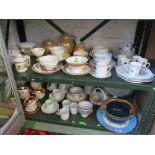 A Limoges part teaset with wide rouge and gilt border, three Limoges cups and four saucers Double