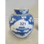 An early 20th Century chinese blue and white ginger jar with reserves of vases and objects within