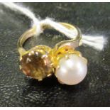 A pearl and Topaz ring