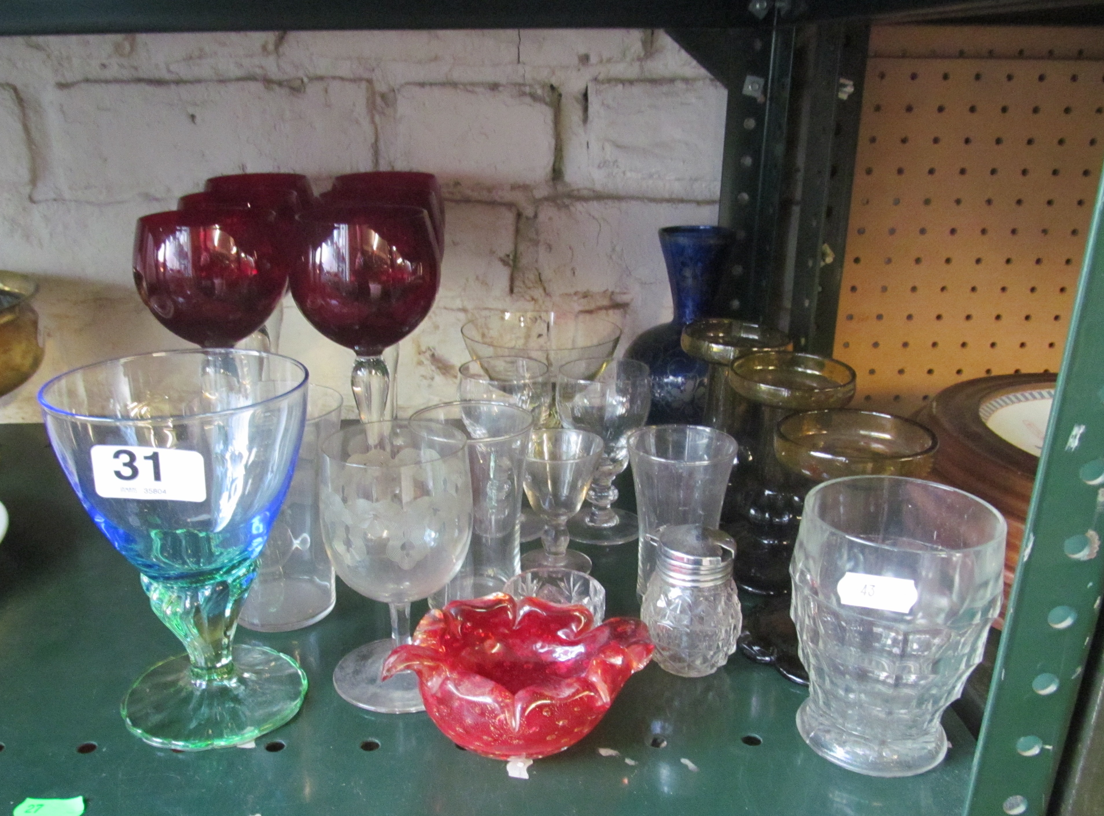 Six Bohemian red glasses and other glass