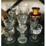 A selection of glasses including toastmaster glasses and a red and gilt glass vase