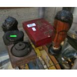 A carved African bust, face ornament, amonite, oriental box, miniature teapot on stand.
