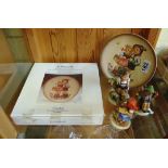 A Hummel Friends Forever 'Surprise' plate and three Hummel figures