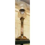 A brass pillar oil lamp converted to electricity