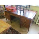 A 1940's mahogany desk