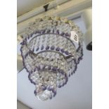 A four tier drop lustre chandelier