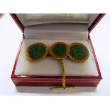 A pair of 18ct gold and jadeite cufflinks and matching tie pin with Greek key pattern rims