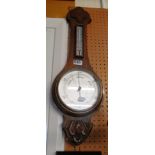 An oak barometer/thermometer