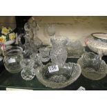 A pair of glass oil and vinegar decanters and other glassware
