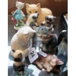 Eight Goebbel cat ornaments