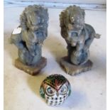 A pair of soapstone Kylin lions and a cloisonné owl.