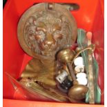 A box of copper/brass, lionhead, leaves door furniture et cetera