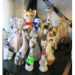 Various blue and white and other cat ornaments