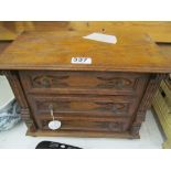 An Edwardian continental oak apprentice chest of three drawers