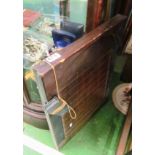 A Shuffle board and box of brass counters