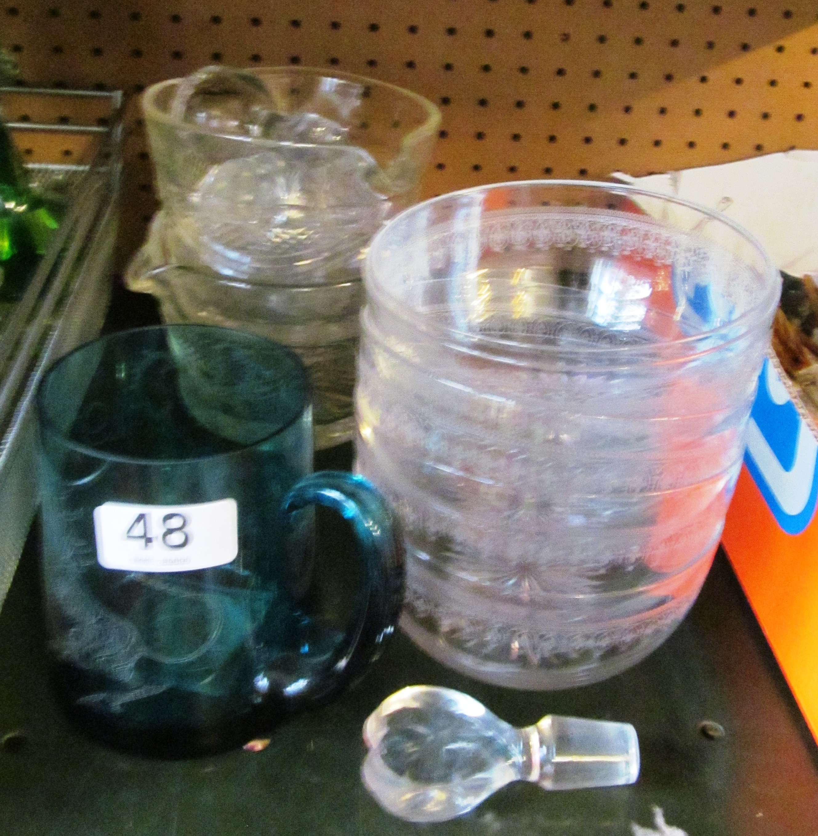 Two glass ice bowls and other glass