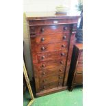 A Victorian burr walnut Wellington chest with eight graduated drawers, fitted knob handles, enclosed