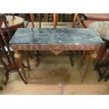 A gilt side table with marble top