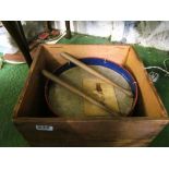 A pine box with drum inside