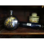 A blue glass rolling pin, glass flask and Doulton tobacco jar