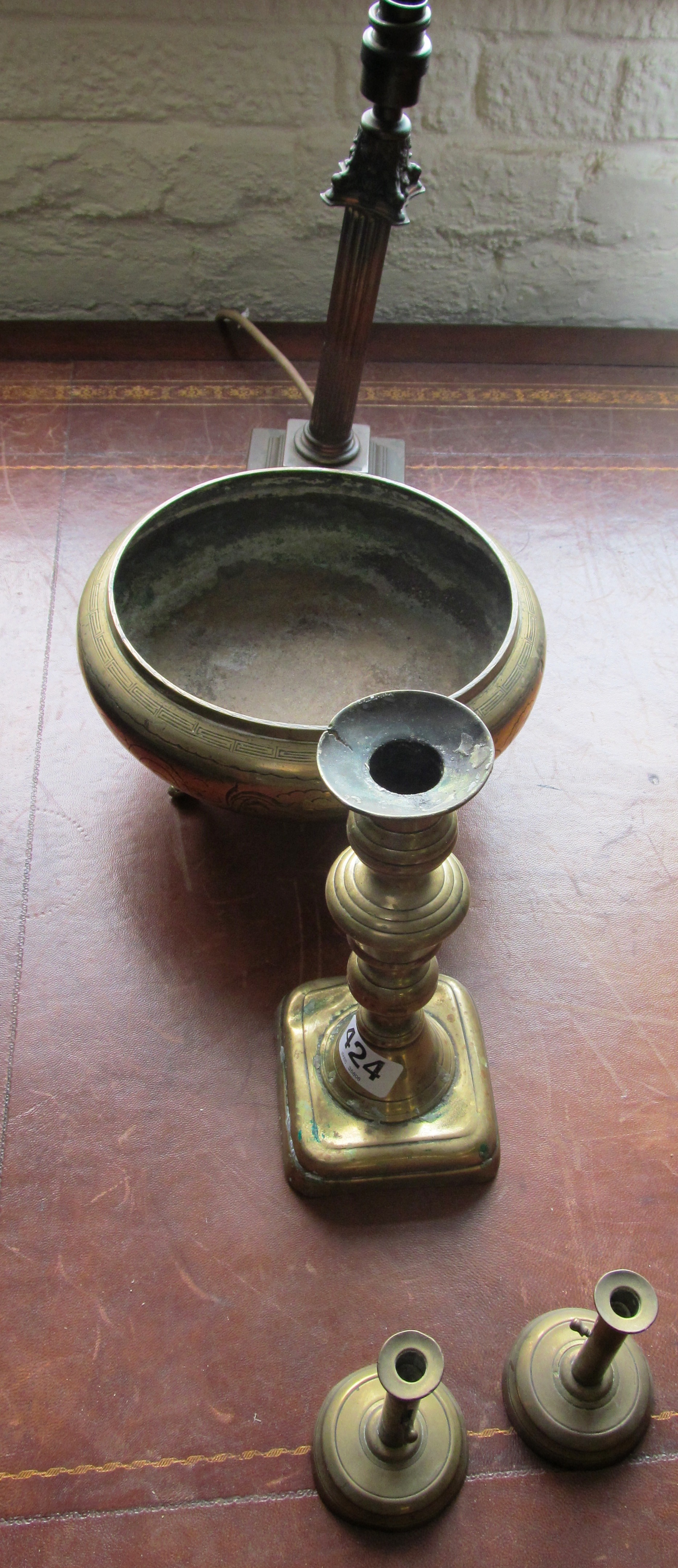 A brass bowl, candlestick and 2 small candlesticks