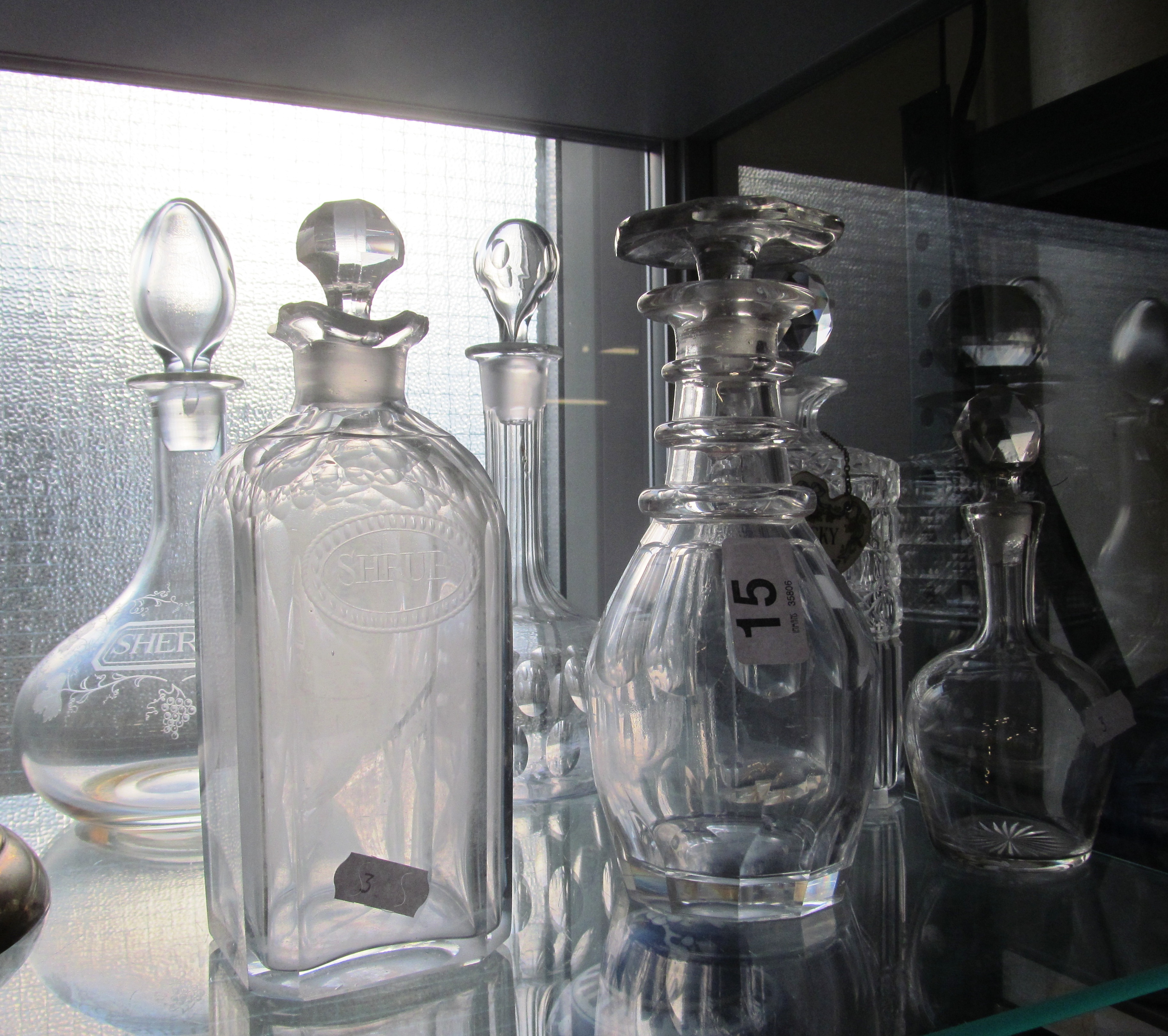 A sherry decanter, Shrub and four decanters