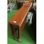 A late Victorian mahogany Sutherland table on turned legs