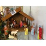 A West German 1960's nativity set; stable, seven ceramic figures and four animals