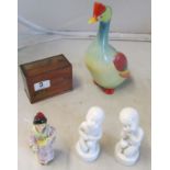 A 1920's card box, figure of girl, pair Copenhagen figures and a duck