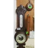 A barometer, small circular barometer and thermometer