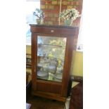 A 19th Century walnut display cabinet with marble top