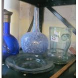 A blue mottled decanter, blue decanter, two ladles, vase and two plates.