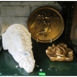 A plaster wall bracket lady amongst flowers, a gilt plaque angel and winged cherub and a small