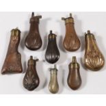 GROUP OF EIGHT POWDER FLASKS