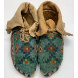 PLATEAU BEADED HIDE MOCCASINS, C. 1910