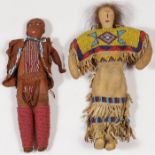 A PAIR OF BEADED HIDE DOLLS