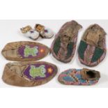 BEADED PLAINS HIDE MOCCASINS, CIRCA 1880-1915