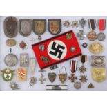 A GROUP OF 40 GERMAN INSIGNIA