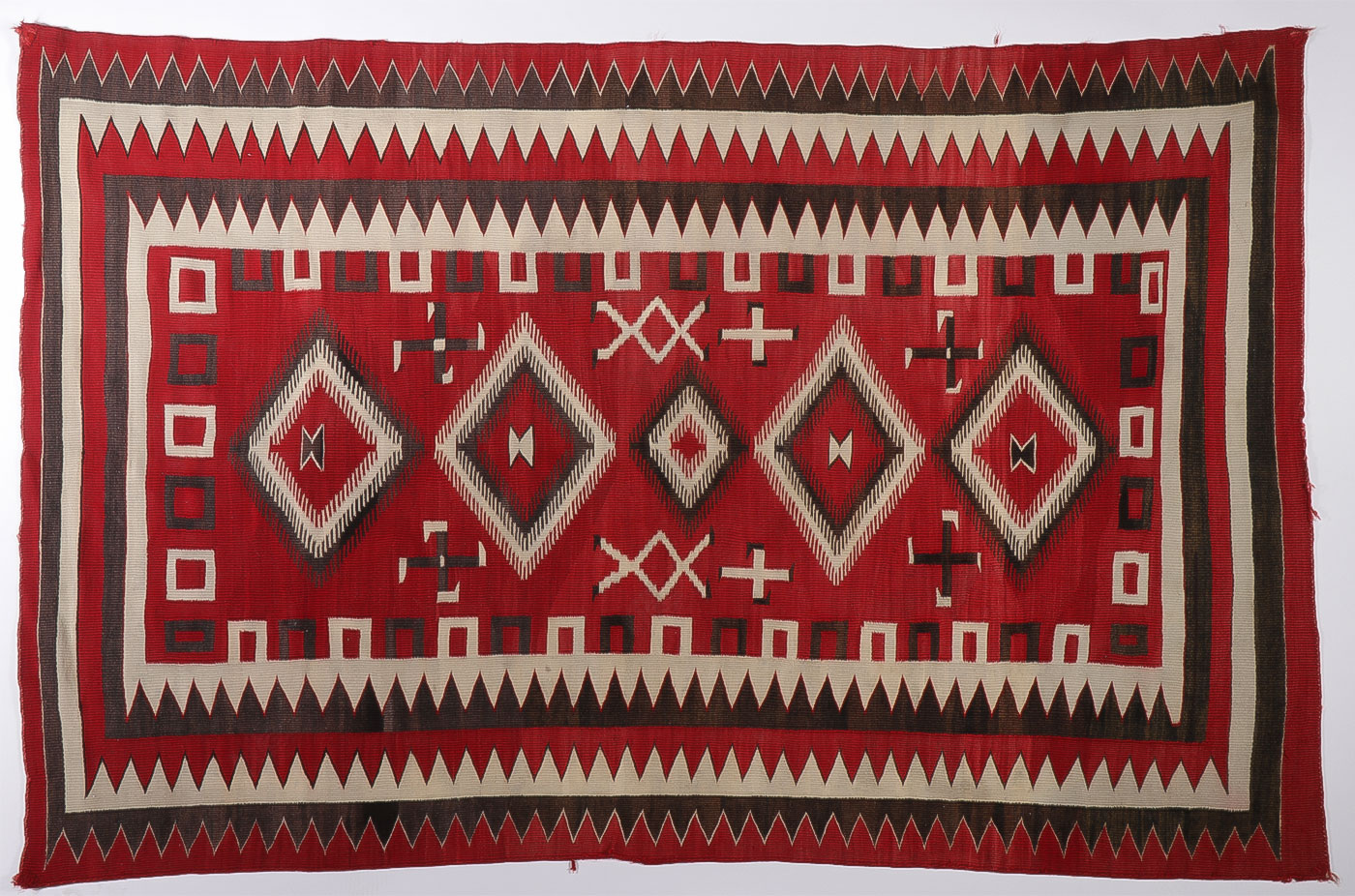 A NAVAJO RED REGIONAL RUG, C. 1935