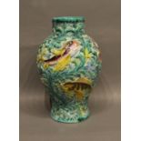 A Majolica Style Oviform Vase Decorated With Fish Amongst Foliage, 32cm tall