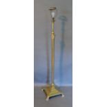 An Edwardian Brass Adjustable Lamp Standard of Corinthian column form with ball and claw feet