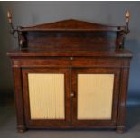 A William IV Burr Oak Chiffonier With A Shelf Back above two frieze drawers and two fabric pleated