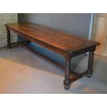 An 18th Century Oak Refectory Dining Table, the plank top above a plain frieze with an end drawer